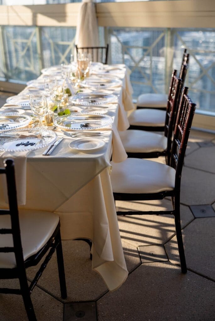 garden-style centerpiece at The Peachtree Club rooftop wedding Atlanta