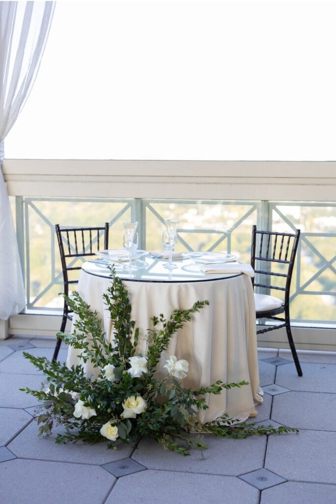 garden-style centerpiece at The Peachtree Club rooftop wedding Atlanta