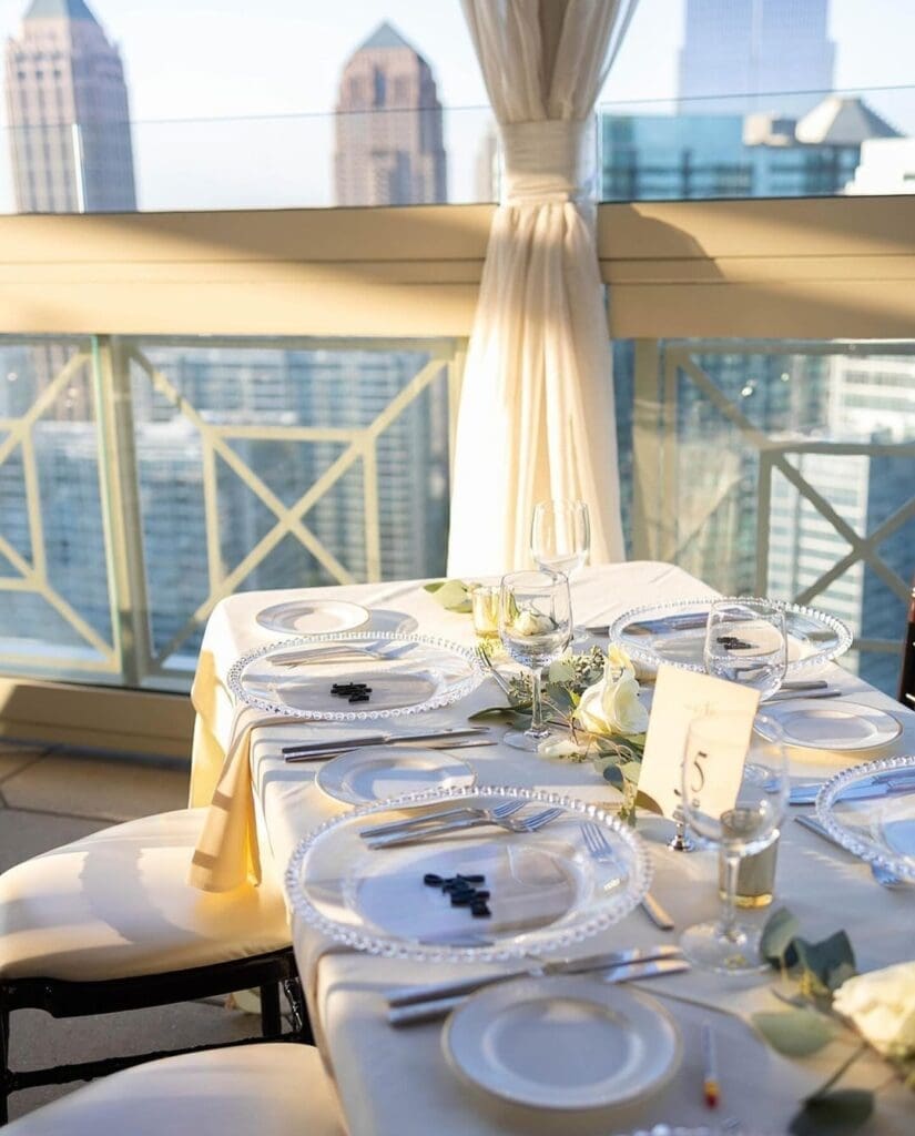 garden-style centerpiece at The Peachtree Club rooftop wedding Atlanta